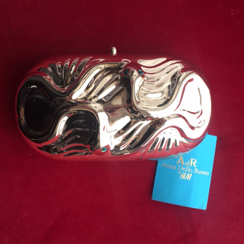 Anna Della Russo gold clutch